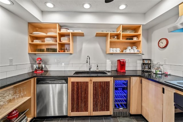 kitchen with dishwasher, sink, wine cooler, wall chimney range hood, and a textured ceiling