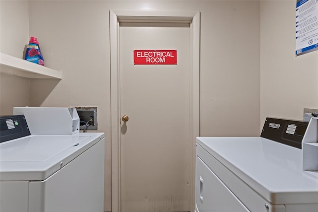 washroom featuring washer and dryer