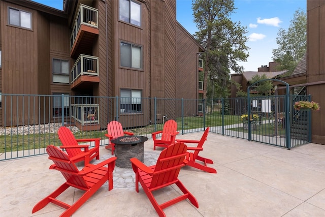 view of patio / terrace featuring an outdoor fire pit