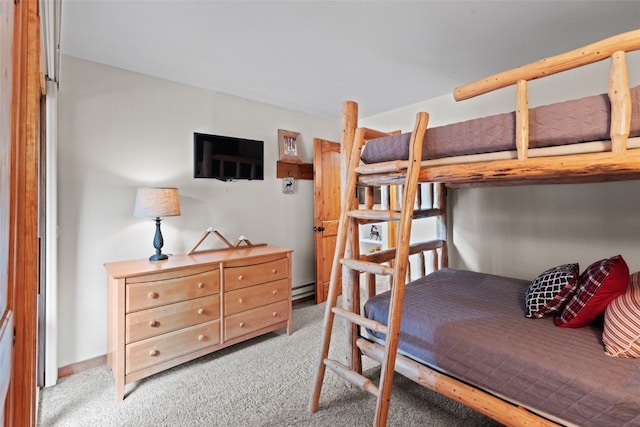 bedroom featuring light colored carpet