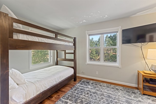 bedroom featuring wood-type flooring