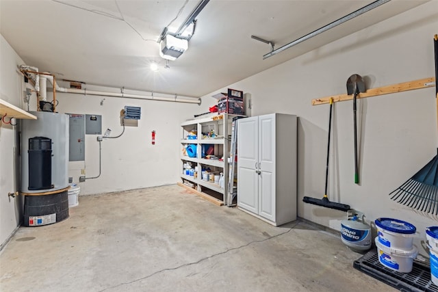 garage featuring electric water heater and a garage door opener