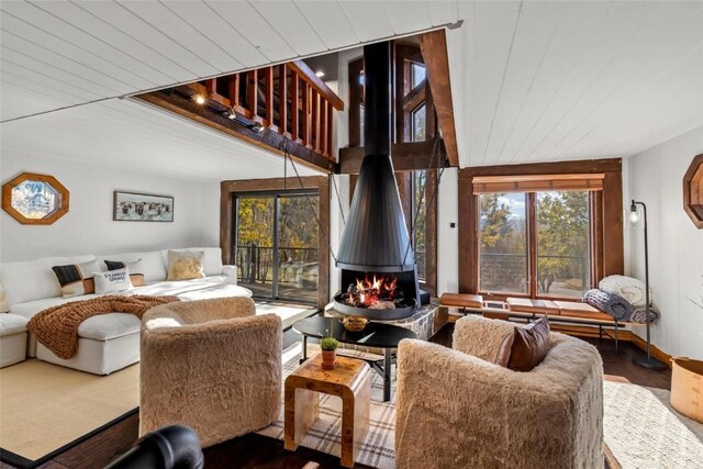 living room featuring wood ceiling and wood-type flooring