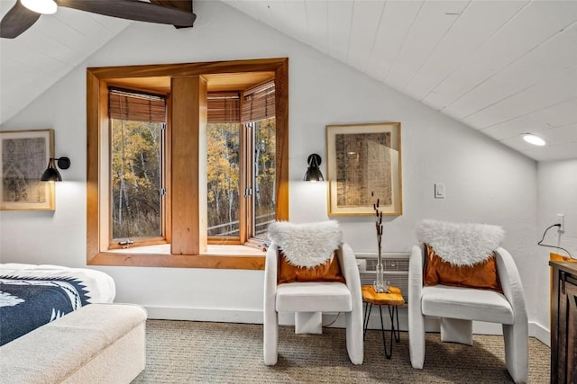 bedroom featuring carpet and lofted ceiling