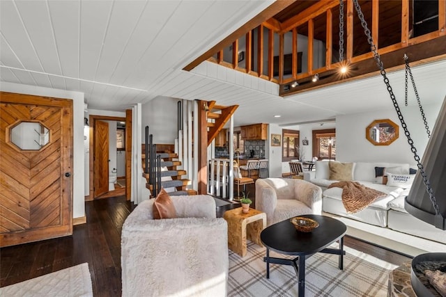 living room with dark hardwood / wood-style floors