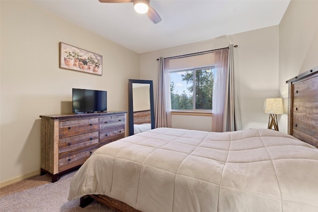 bedroom featuring ceiling fan and light carpet