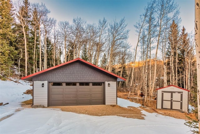 view of snow covered garage