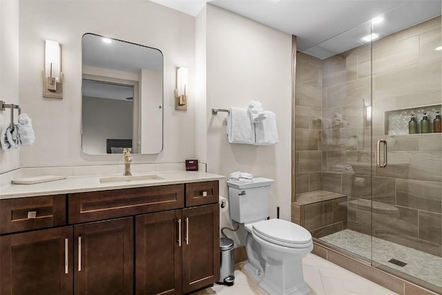 bathroom with walk in shower, tile patterned flooring, vanity, and toilet