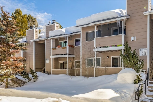 view of snow covered property