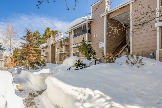 view of snow covered property