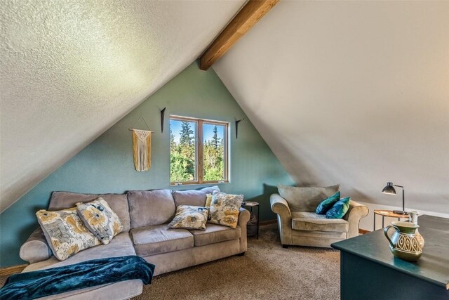 living area with lofted ceiling with beams, carpet, and a textured ceiling