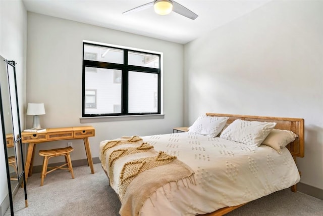 bedroom with ceiling fan and carpet