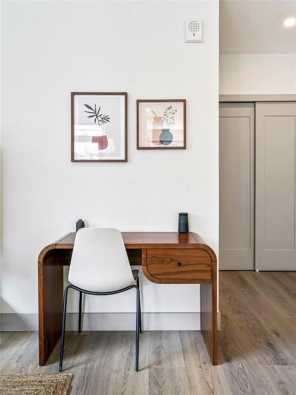 office area with hardwood / wood-style flooring