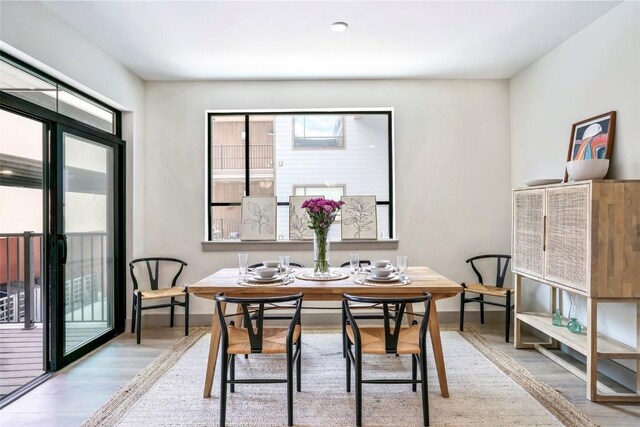 dining room featuring light hardwood / wood-style floors