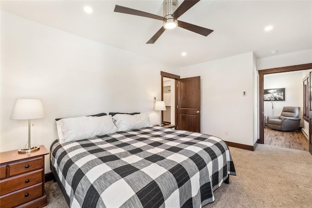 bedroom with recessed lighting, baseboards, light carpet, and ceiling fan