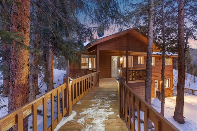 view of snow covered deck