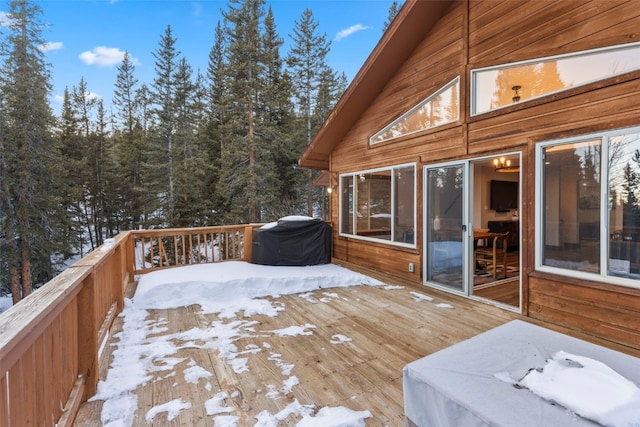 wooden deck featuring area for grilling