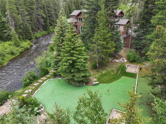 aerial view with a wooded view