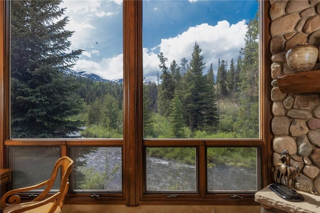 interior space with a forest view