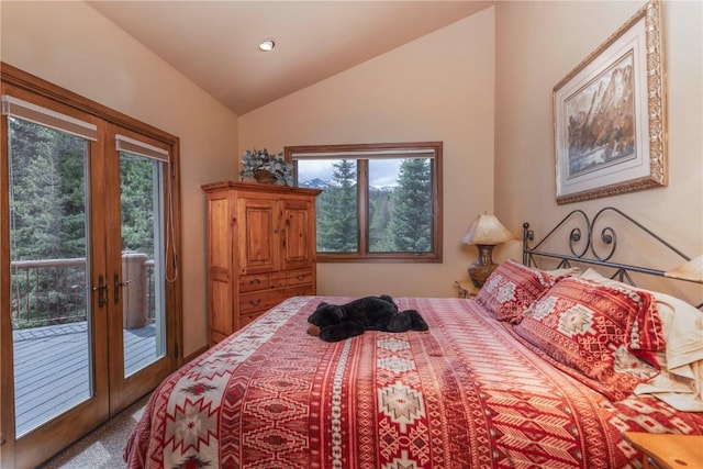 carpeted bedroom with access to exterior, multiple windows, french doors, and lofted ceiling