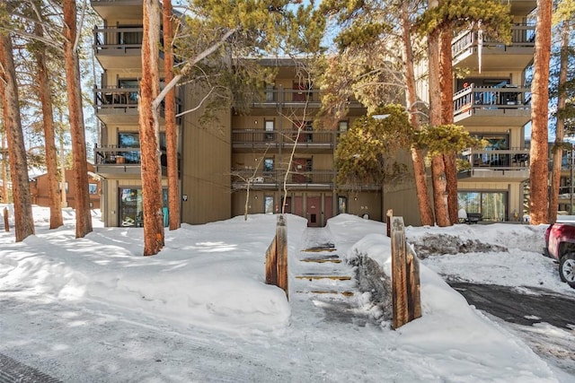 view of snow covered property