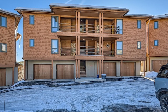 view of front of home with a balcony