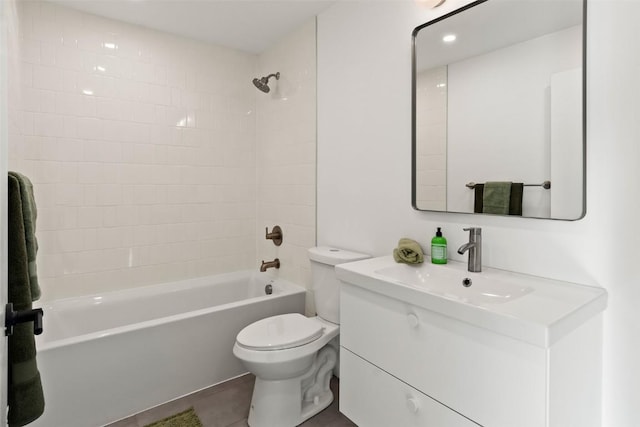 full bathroom with tile patterned flooring, vanity, shower / bath combination, and toilet