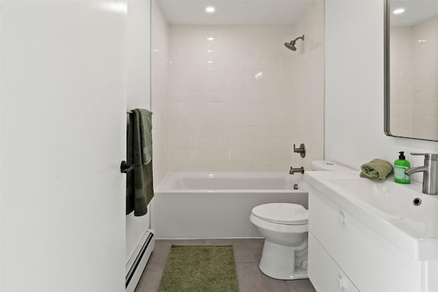 full bathroom with vanity, toilet, tiled shower / bath, and a baseboard heating unit