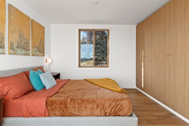 bedroom featuring hardwood / wood-style flooring