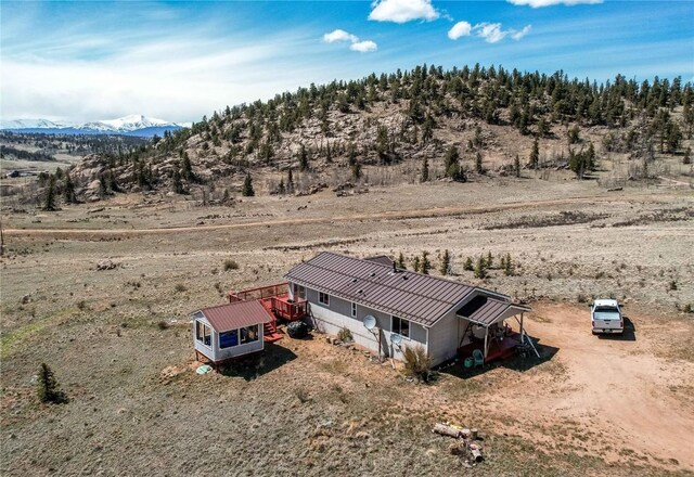 aerial view with a mountain view and a rural view