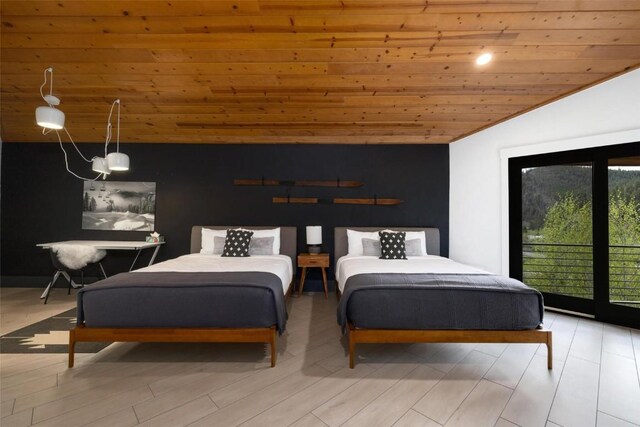 bedroom with wooden ceiling and vaulted ceiling