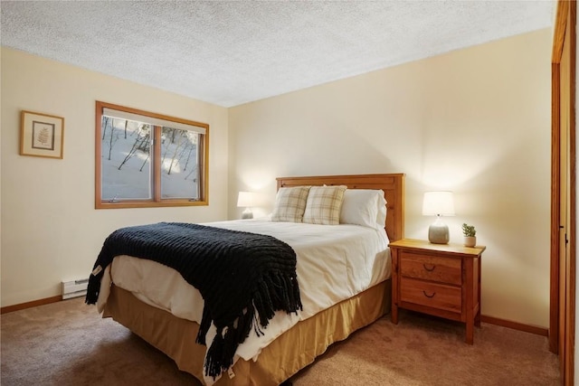 bedroom featuring a baseboard radiator, baseboards, light colored carpet, and a textured ceiling