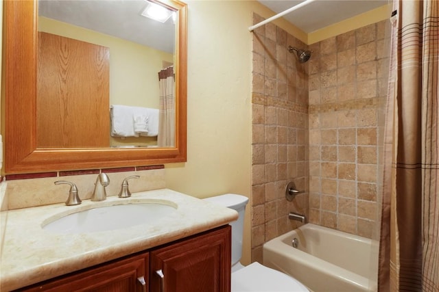 bathroom featuring toilet, vanity, and shower / bath combination with curtain