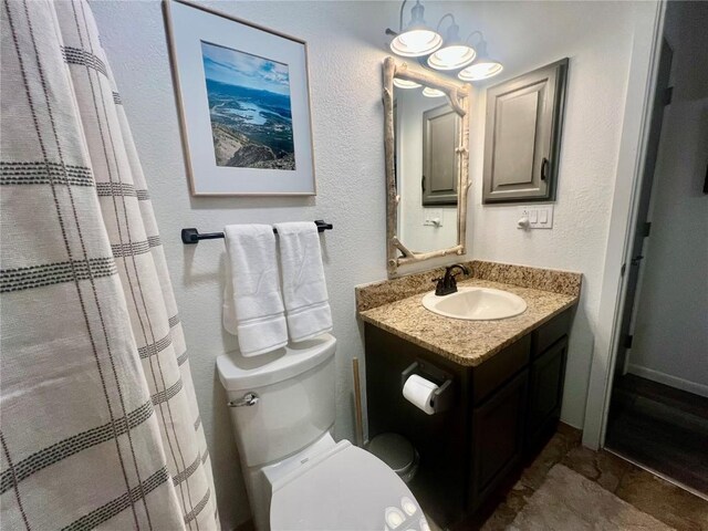 kitchen with sink, a breakfast bar area, dishwasher, decorative light fixtures, and kitchen peninsula