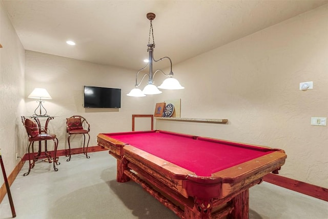 game room featuring pool table, a textured wall, baseboards, and carpet floors