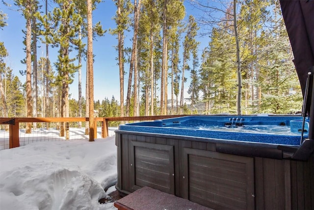 view of patio / terrace with a deck and a hot tub