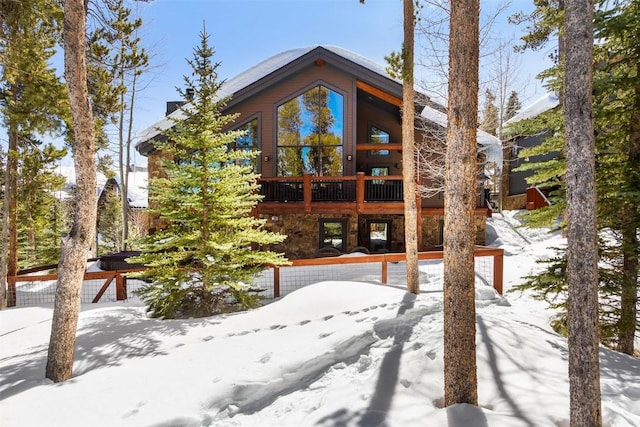 view of snow covered house