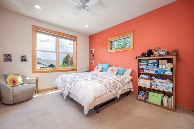 carpeted bedroom with ceiling fan