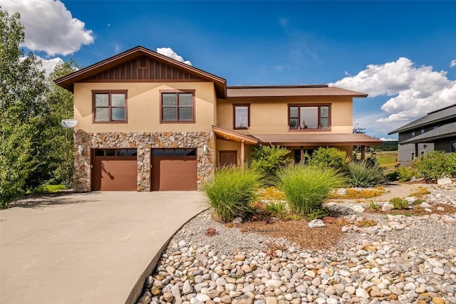 view of front of property featuring a garage