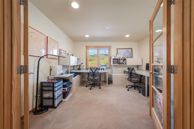 home office with light carpet