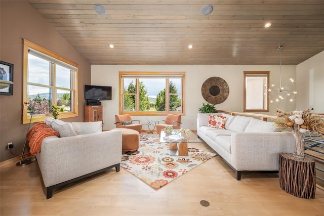 living room featuring wood ceiling, a chandelier, light hardwood / wood-style floors, and lofted ceiling