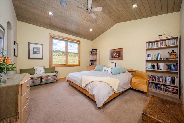 carpeted bedroom featuring ceiling fan, wooden ceiling, and vaulted ceiling