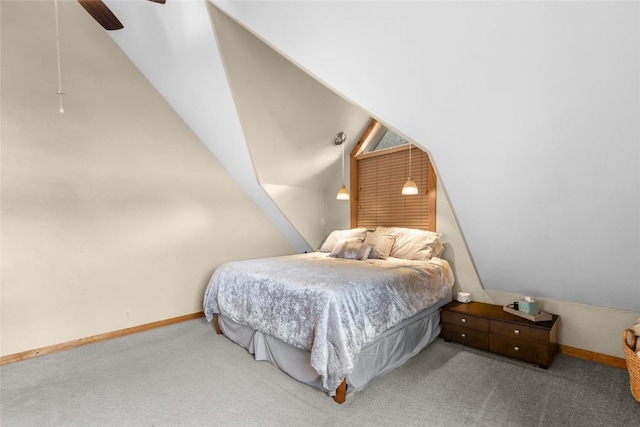 carpeted bedroom featuring vaulted ceiling and ceiling fan