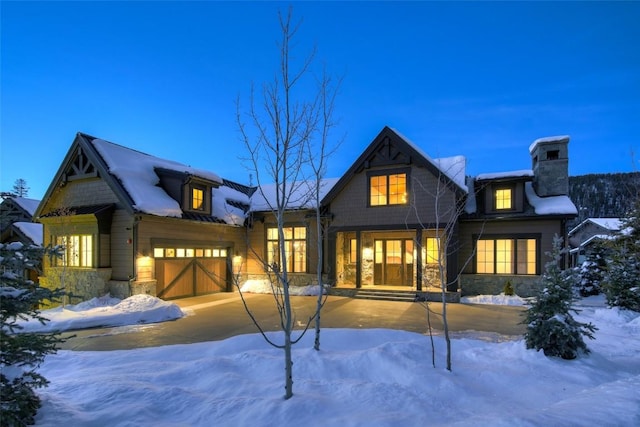 view of front of property with a garage