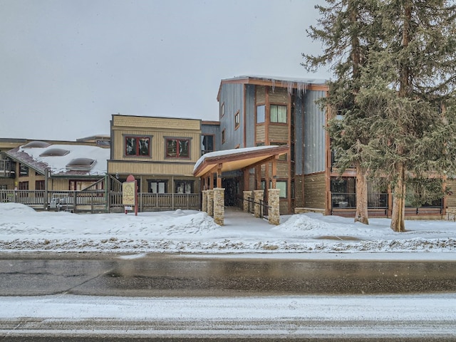 view of snow covered property