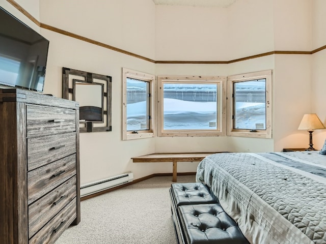 bedroom featuring a baseboard heating unit, a towering ceiling, carpet floors, and baseboards