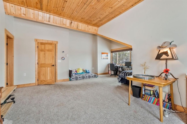 office space with baseboards, carpet floors, high vaulted ceiling, and wooden ceiling