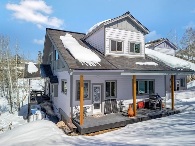 view of front of home with a porch and board and batten siding