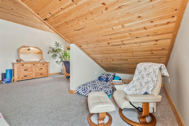 sitting room featuring baseboards, lofted ceiling, wood ceiling, and carpet flooring