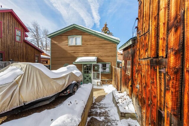 view of snow covered property